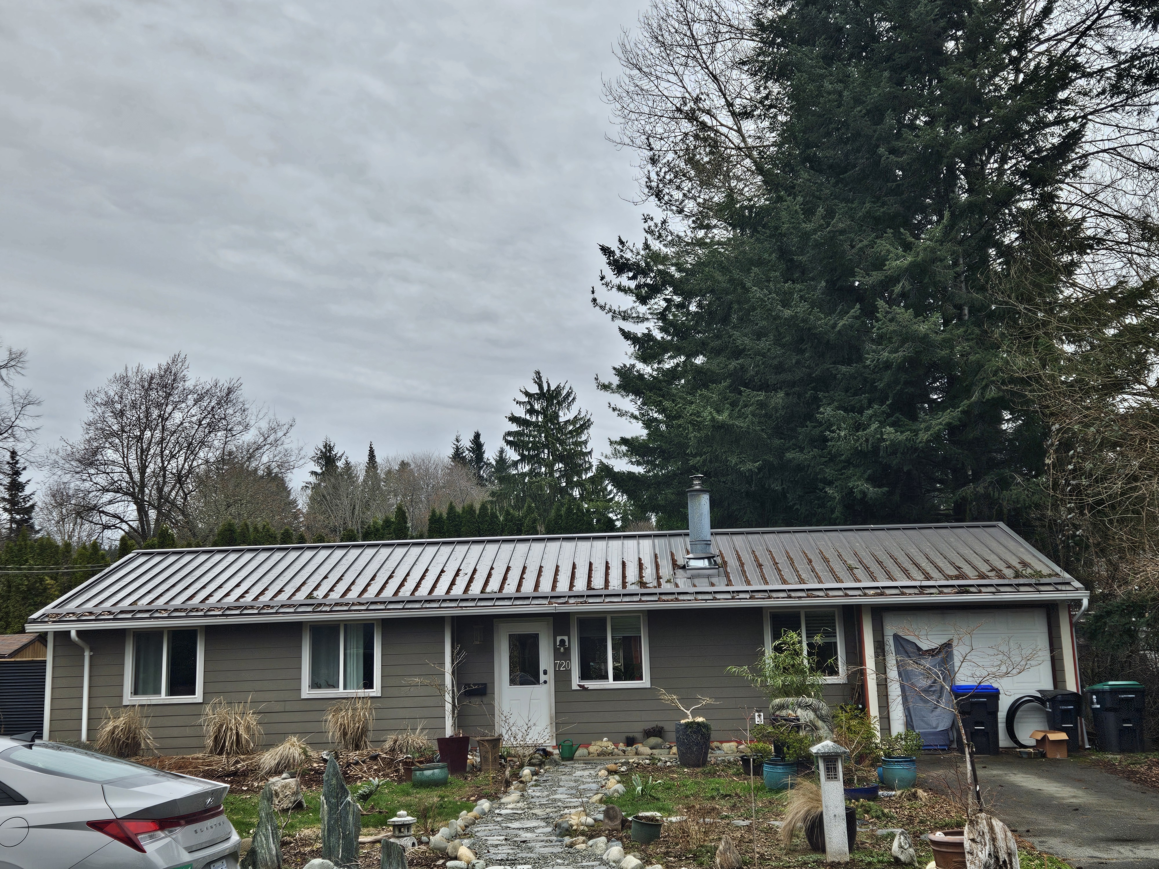 Completed metal roof on a coastal home in Comox